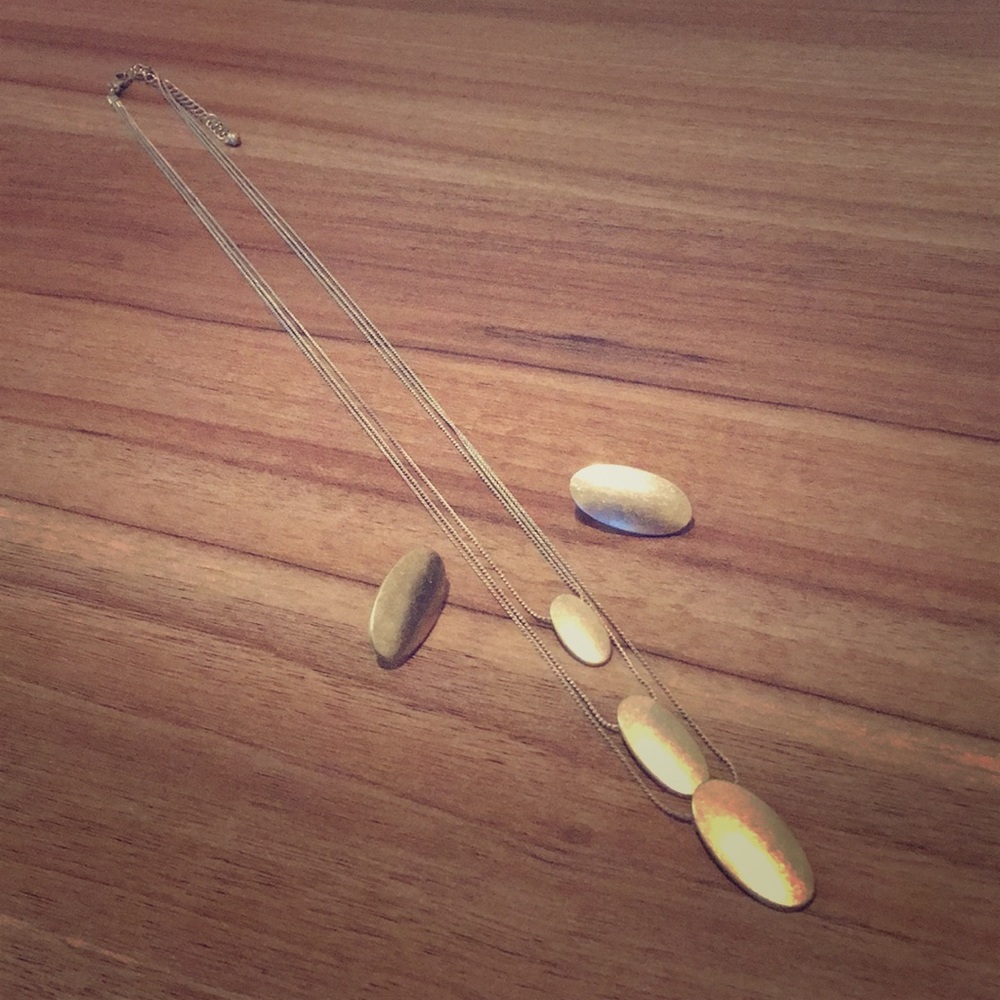 Modern oval pendant tiered necklace and earrings